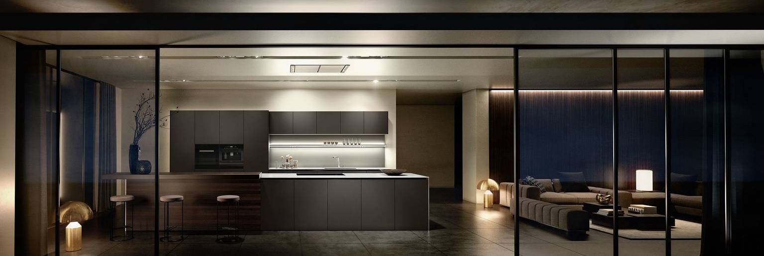 SieMatic Pure S2 SE kitchen island with prep area as well as raised breakfast bar in smoked oak